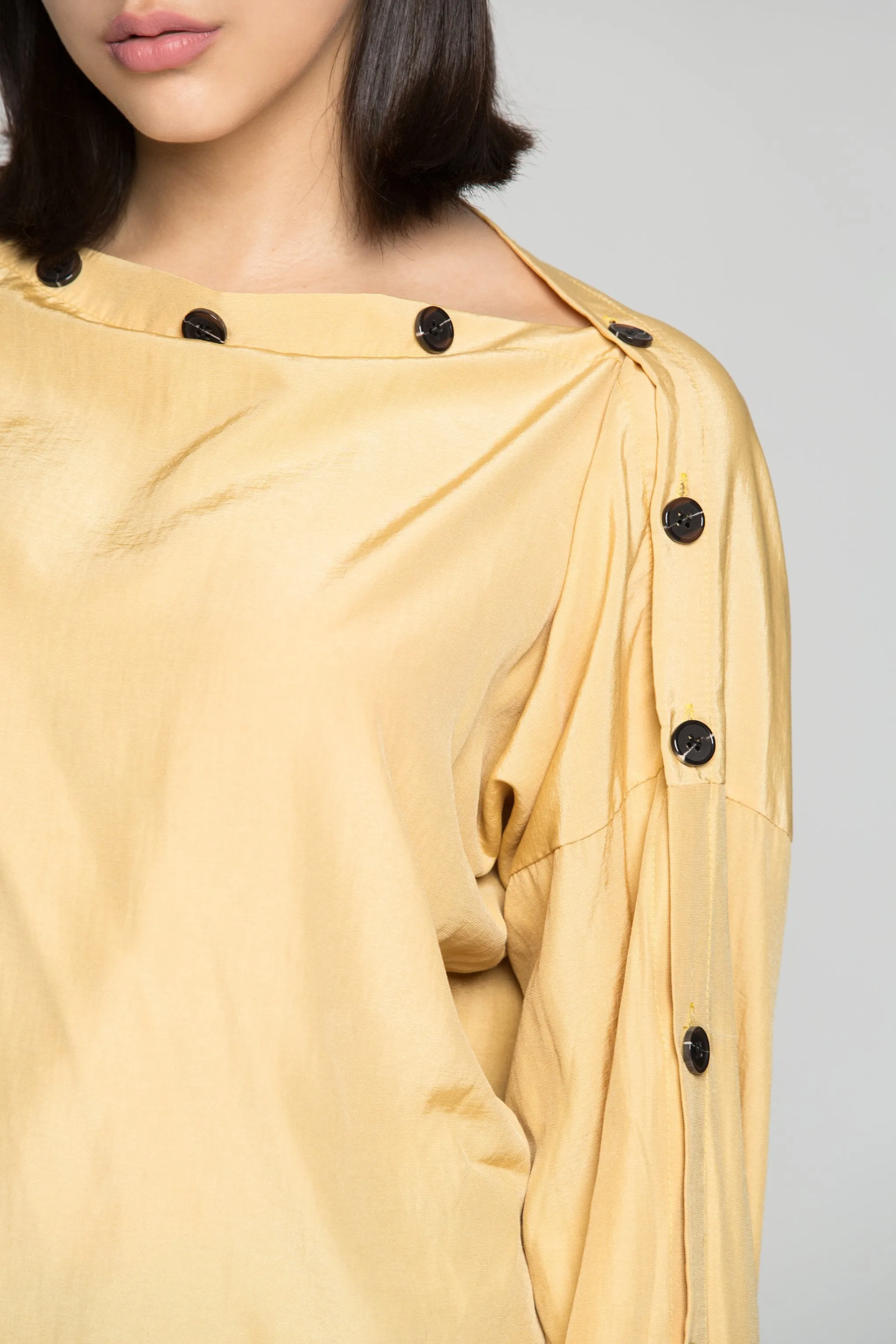 Butterscotch Bataeu Neck Black Buttons Full Sleeves Top