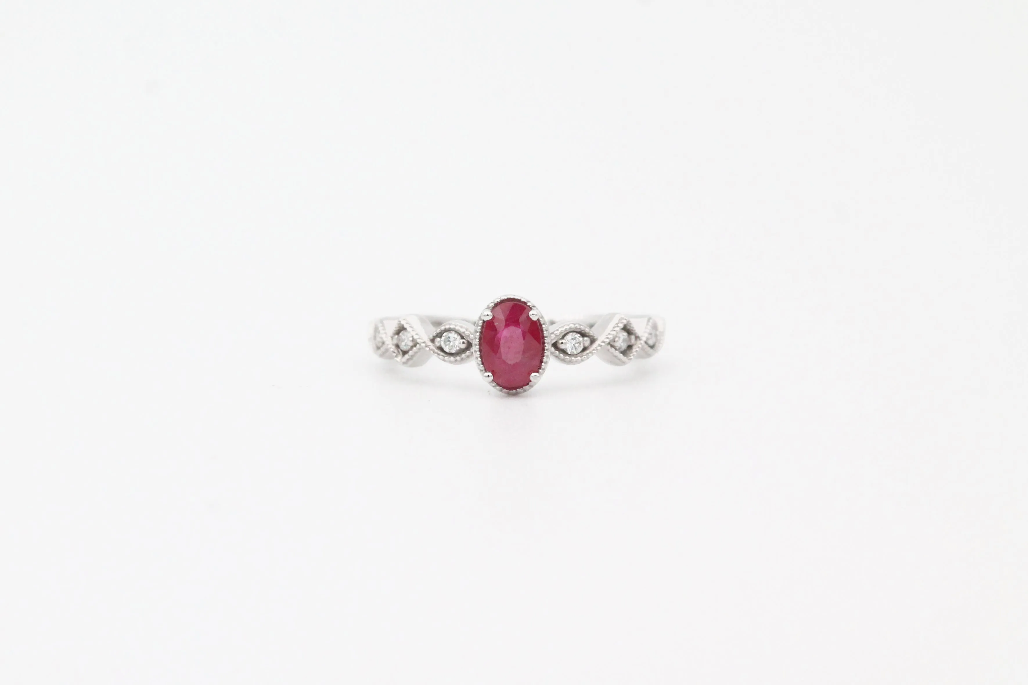 White Gold Oval Ruby and Diamond Ring with Milgrain Band